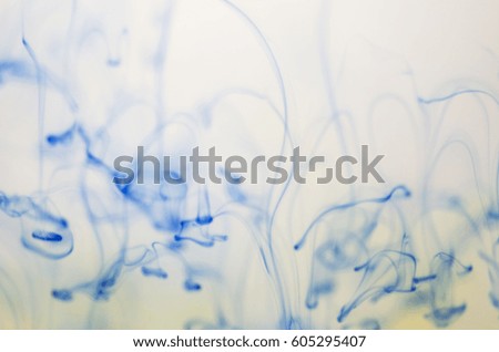 Blue paint dissolves in water