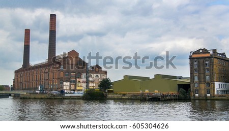 River view of a disused power station near Chelsea, London Royalty-Free Stock Photo #605304626