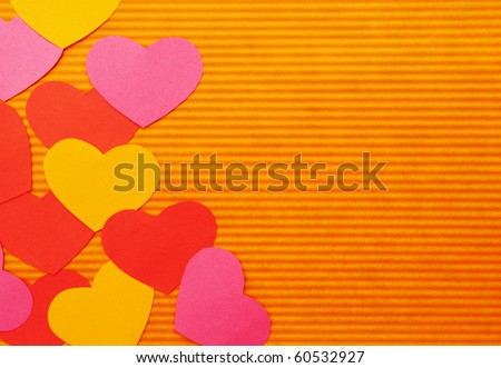 Left side abstract simple love hearts composition background. Paper cutout. Colorful Cartoon hearts.