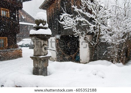In the village during snowfall