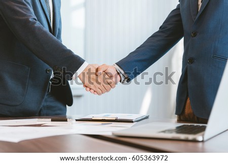 business concept, businessman handshake in office workspace