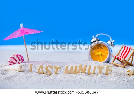 last minute to count down for travel metaphor by old retro clock on sand beach ,abstract background to time for summer vacation or travel vacation concept. Royalty-Free Stock Photo #605388047