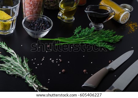 Set of spices, oil and herbs prepared for cooking Royalty-Free Stock Photo #605406227