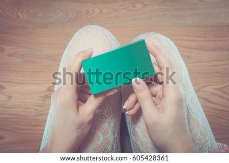 Girl on a table with condom book heart nameplate foot pants. hd