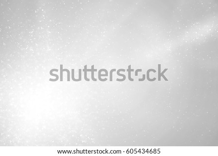 White abstract background with bokeh light, glitter lights or sparkles. Design - template