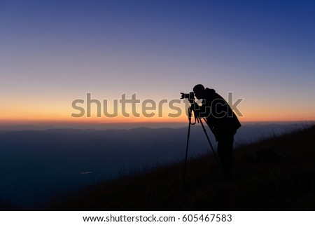 Photographer and sunset
