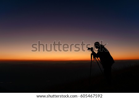Photographer and sunset