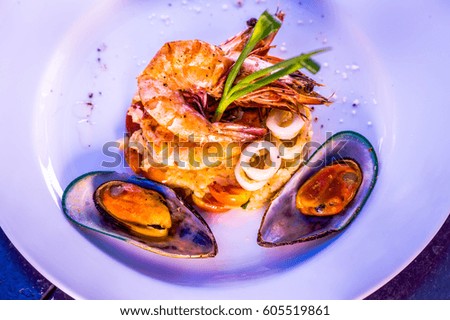 Mixed seafood set fine dining, studio outdoors at summer, selective focus

