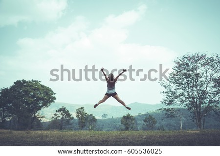 Jumping posture happy holidays Nature trails, forests, mountains