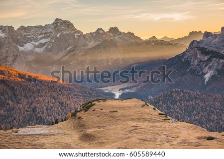Famous italian hiking tourism trail in Tre Cime di Laveredo. View of majestic sky amazing mountains at beautiful sunrise background.
