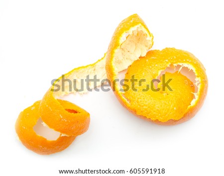 Orange twist of citrus peel on white background