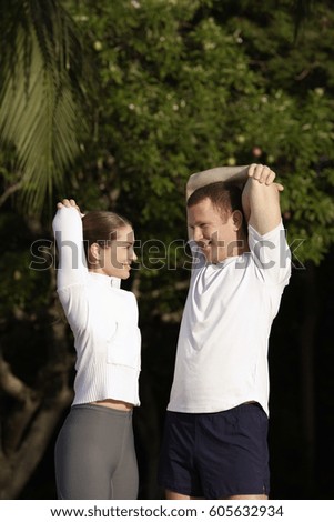couple stretching before run