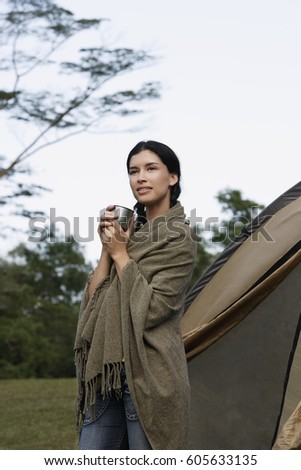 Young woman camping