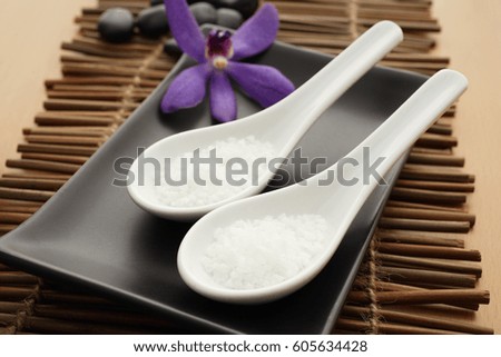 Spa still life with salt in spoons.
