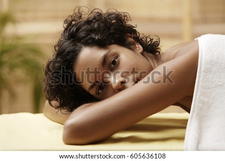Young woman relaxing on massage table