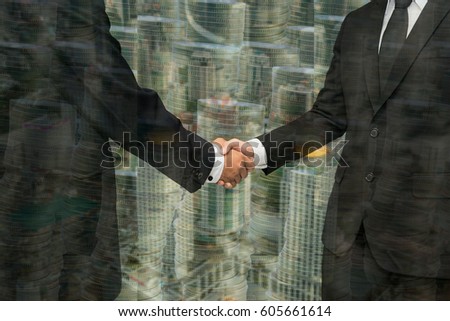Double exposure Asian Business people shaking hands, finishing up a meeting,mission complete,Gold coins,city