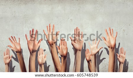 Group of people rise hands . Mixed media