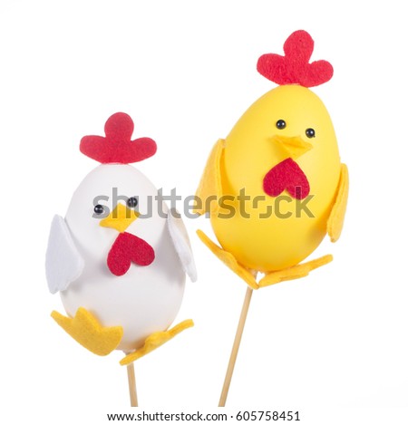 Decorative rooster with wooden stick. Easter decoration. Interior decor. Rooster isolated on white background.