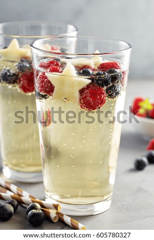 Red, blue and white sangria with sparkling wine
