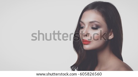 Portrait of beautiful young woman face. Isolated on white background