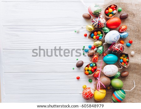  colored easter eggs and  on white background  Royalty-Free Stock Photo #605848979