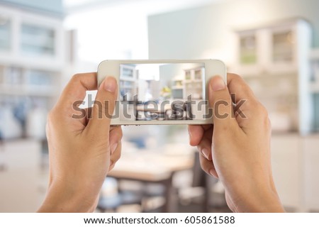 Taking photo with mobile smart phoneTaking photo with mobile smart phone Royalty-Free Stock Photo #605861588