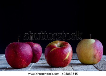 Apples on old table
