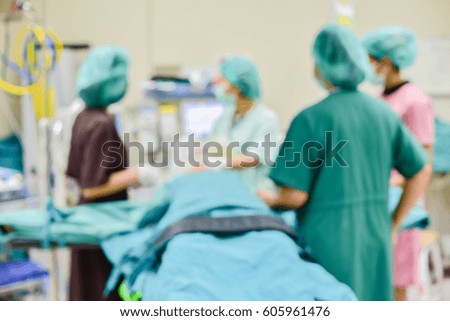 Blurred of teamwork and patient in operating room at hospital
