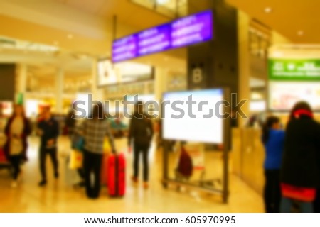 The blurry scene of people in the terminal hall represent the travel industry concept airport atmosphere concept related idea.