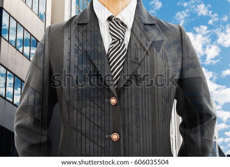  Businessman with Double exposure photo of Office buildings against blue sky