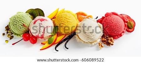 Row of colorful ice cream scoops with decorations, shot from above, isolated on white background