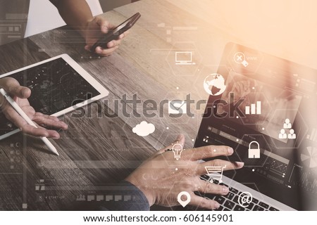 co working team meeting concept,businessman using smart phone and laptop and digital tablet computer in modern office with virtual interface icons network diagram