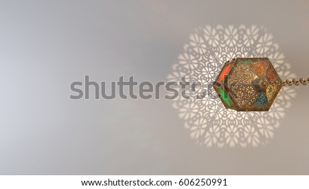 A stunning Ramadan candle lantern, Featuring such intricate patterns and cut work like an exotic treasure. Buy it now and start using this quality photo in your design. Royalty-Free Stock Photo #606250991