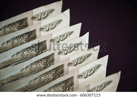 russian banknotes in row on dark background