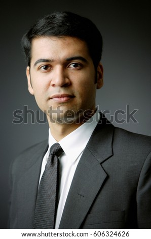 Businessman looking at camera, portrait