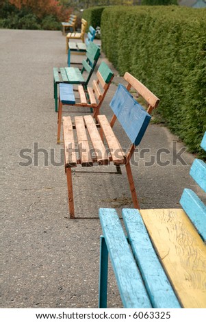 colorful park benches in a row