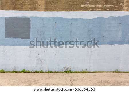 Background of old gray painted wall. Aged street wall background, texture.