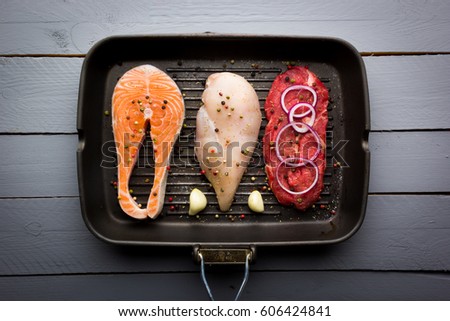 Animal proteins ready to be cooked Royalty-Free Stock Photo #606424841