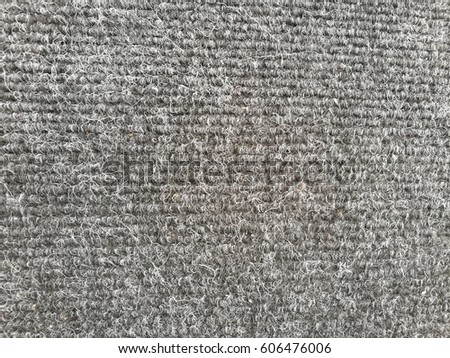Texture of floor mat; ribbed carpet; can be use as background, education, for showing material; or concept of looking neat but actually messy (stripes pattern but tangled lines), conflict pattern