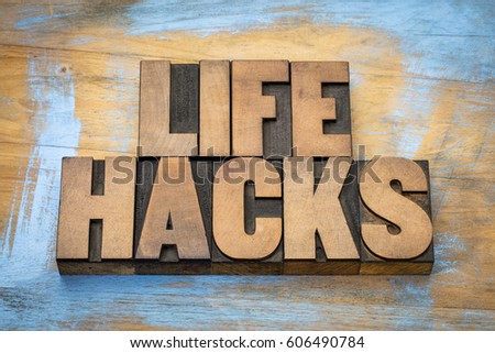 life hacks  - word abstract in vintage letterpress printing blocks against grunge wooden background