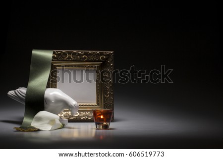 mournin dove with blank gold frame for sympathy card on dark background