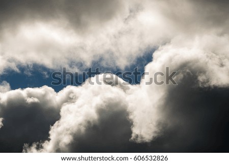 cloudy skies with blue gap
