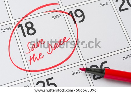 Save the Date written on a calendar - June 18 Royalty-Free Stock Photo #606563096