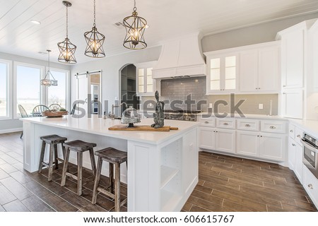 Modern New Kitchen Remodeled White  Royalty-Free Stock Photo #606615767