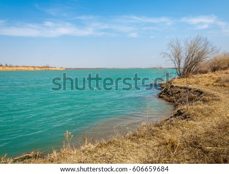 river spring. spring river in Central Asia. Kazakhstan steppe river Semirechye. 