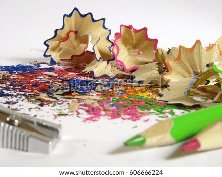 Closeup of colored pencils and its shavings. Sharpening pencils.