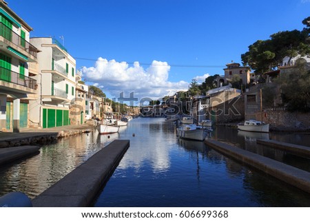 Fishing village Cala Figuera port with slipway, boatshouses and boats, Majorca, Spain Royalty-Free Stock Photo #606699368