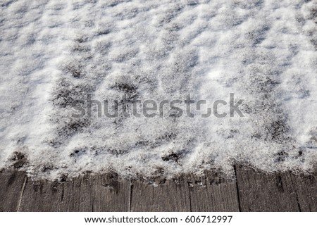 snow on the wood ground