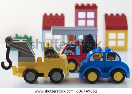 traffic jam in the city. Fireworker, blue car and wrecking truck