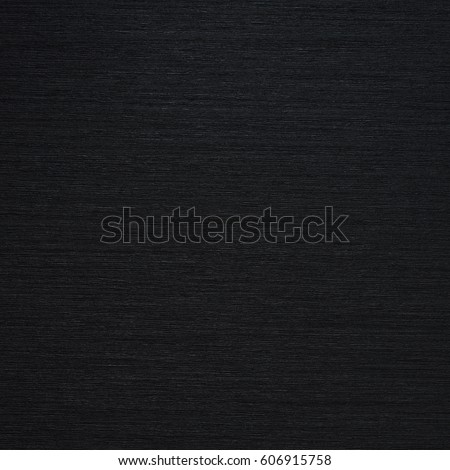 Black pattern of brushed metal, abstract metallic background